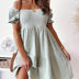 Off-shoulder ruched midi dress.