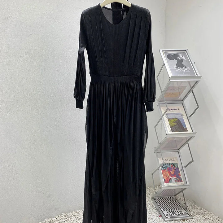 Irregular pleated long dress with belt.