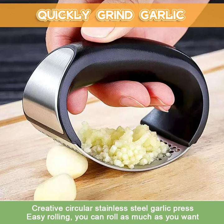 Stainless steel garlic press.