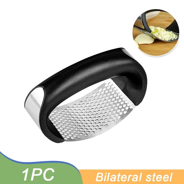 Stainless steel garlic press.